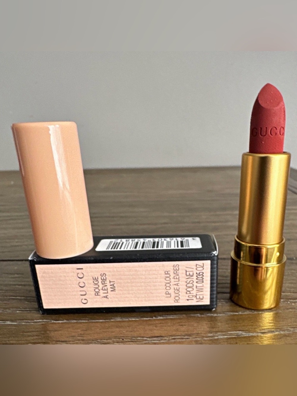 Gucci Matte Lipstick in Blush Pink Case with Gold Tube and Red Bullet
